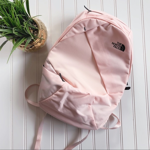 north face light pink backpack